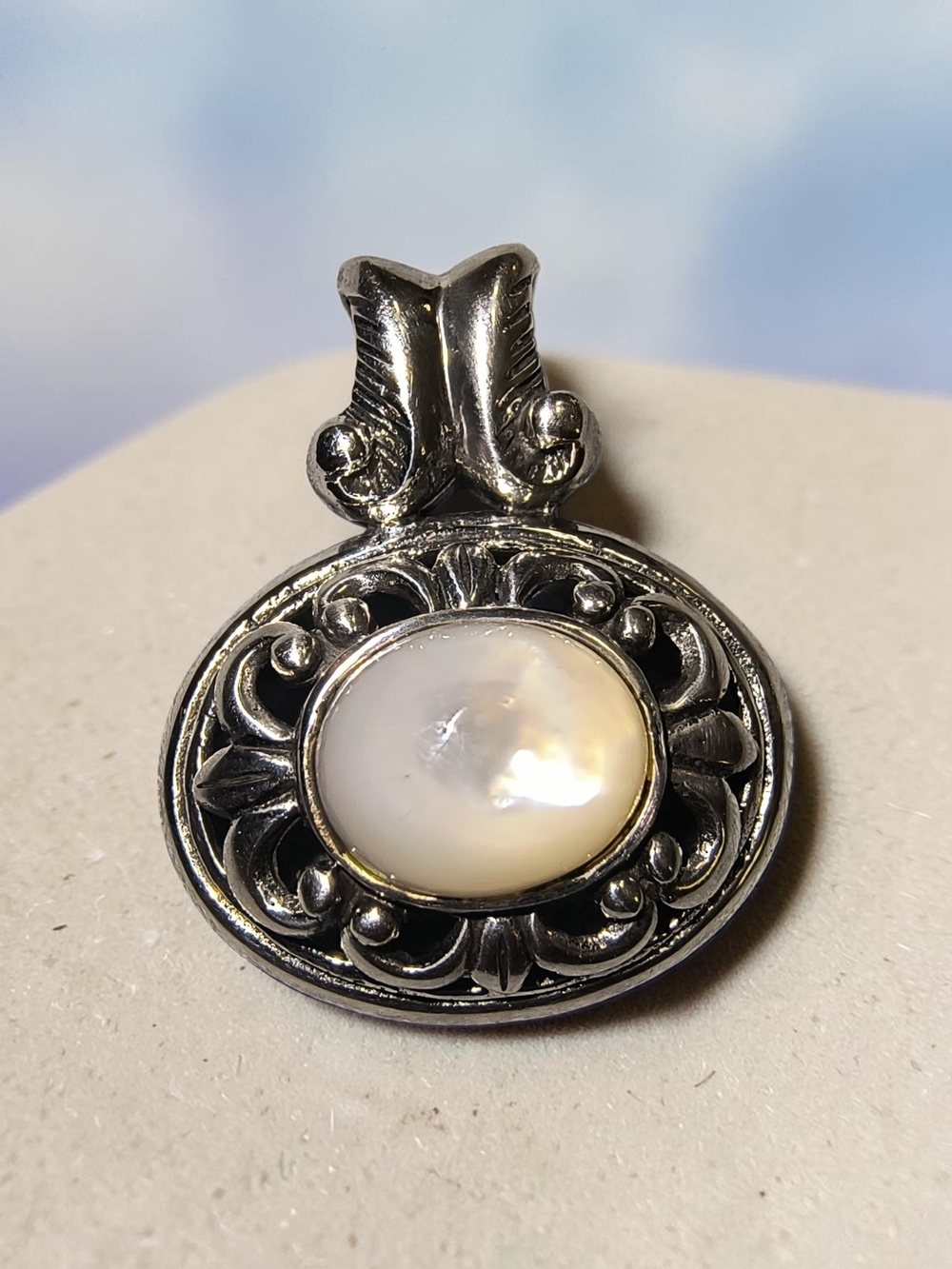 Sterling Silver And Luminous Mother of Pearl Oval Pendant